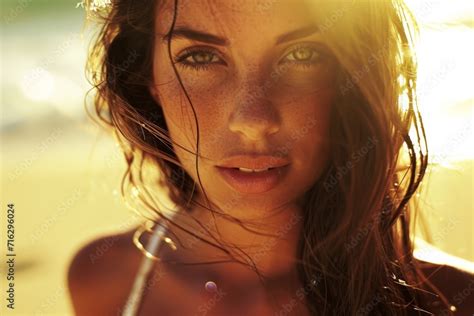 Sun Kissed Brunette Stuns In A White Bikini Ready For The Beach Stock Photo Adobe Stock