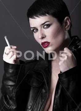 Naked Woman With Black Leather Jacket Smoking A Cigarette Hi Res