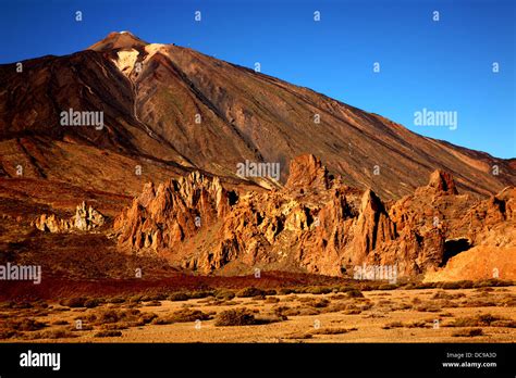 Volcano Teide With Los Roques De Garcia In The Foreground Island