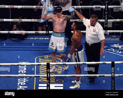 Referee Marcus Mcdonnell Lifts The Hand Of Campbell Hatton After