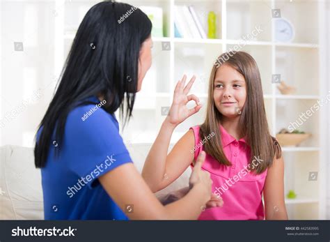 Smiling Deaf Girl Learning Sign Language Stock Photo (Edit Now) 442583995