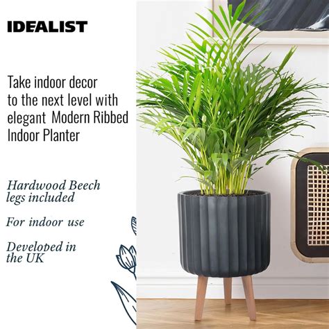 IDEALIST Lite Modern Ribbed Black Cylinder Planter With Legs Round