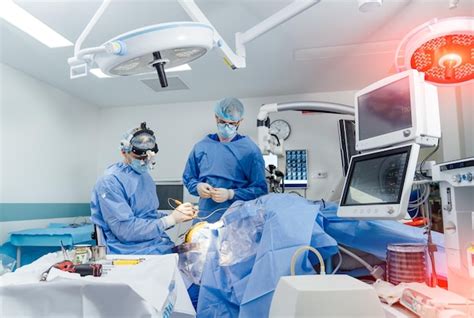 Premium Photo Team Surgeon At Work In Operating Room Modern Equipment