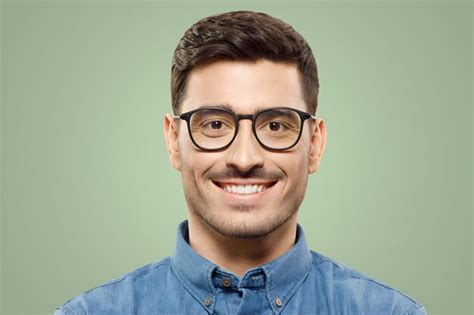 Premium Photo Headshot Portrait Of Handsome Smiling Man In Blue Denim Shirt Wearing Glasses