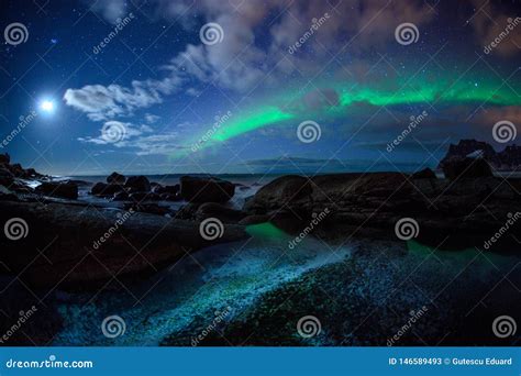 Winter Landscape with Aurora Borealis and Full Moon in Lofoten ...