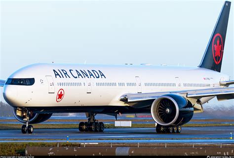 C FNNQ Air Canada Boeing 777 333ER Photo By Guillaume Fevrier ID