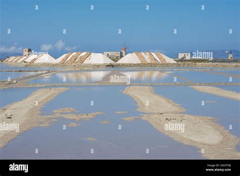 Salt processing, Italy Stock Photo - Alamy