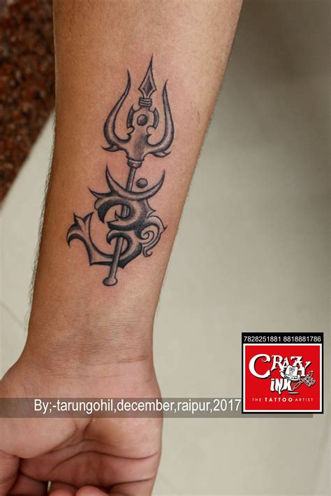 Trishul With Om Tattoo Design On Forearms Done By Tarun Gohil At Crazy