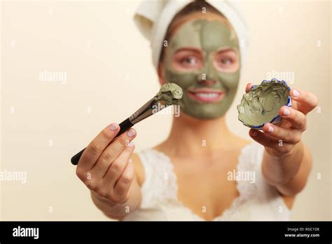 Skin Care Woman Applying With Brush Clay Mud Mask To Her Face Girl Taking Care Of Oily