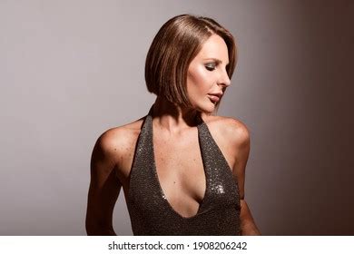 Sexy Blonde Woman Wearing Shiny Grey Stock Photo 1908206242 Shutterstock