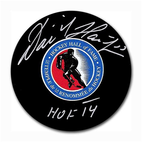 Dominik Hasek Autographed Hockey Hall Of Fame Puck W HOF 14 Inscription