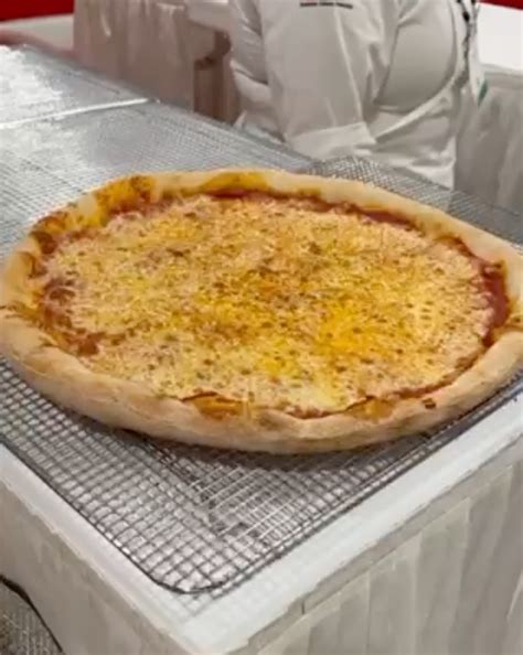Beer in each hand, man wears impressive July 4 outfit
