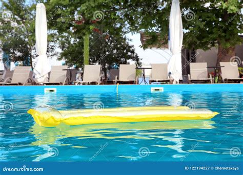 Inflatable Mattress Floating in Swimming Pool Stock Image - Image of ...