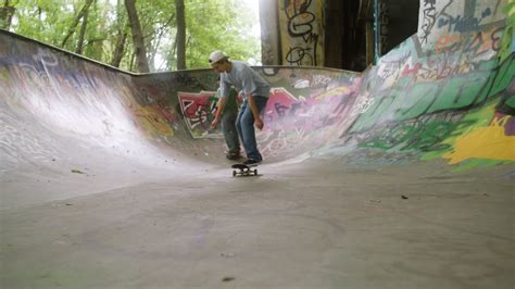 Free stock video - Caucasian boys skateboarding in the park.