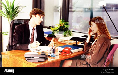 Business meeting man and woman Stock Photo - Alamy