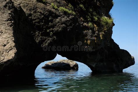 Picturesque View of Natural Stone Arch Above Sea. Rock Formation Stock ...