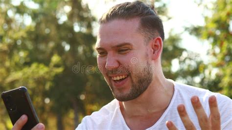 Young Man Showing Sincere Excitement While Looking At Camera Summer