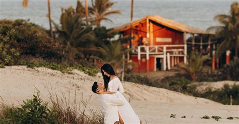 Couple Hugging on a Beach · Free Stock Photo