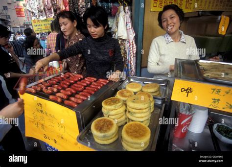 fast food in a market street in the city of Shenzhen north of Hongkong ...