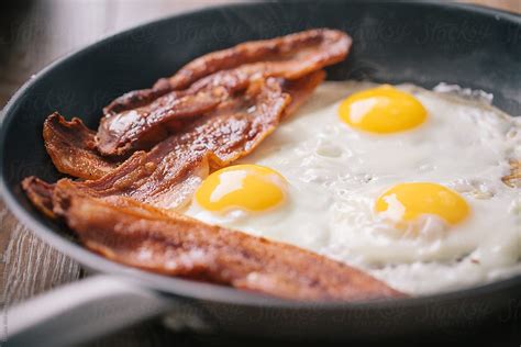 "Eggs And Bacon" by Stocksy Contributor "Davide Illini" - Stocksy