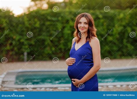 Cute Pregnant Brunette Hugs Pregnant Belly Stock Photo Image Of Birth Brunette