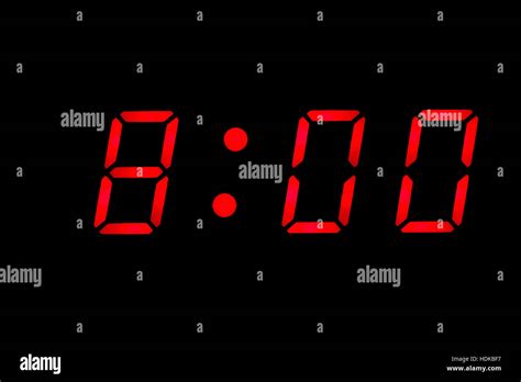 Digital clock closeup displaying 8:00 o'clock Stock Photo - Alamy