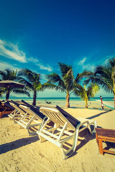 Umbrella And Chair Around Beach And Sea For Travel And Vacation Safe