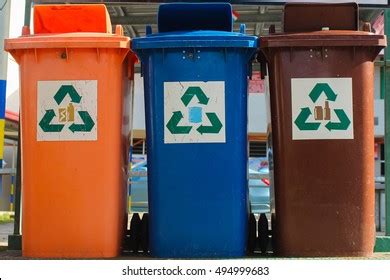 yellow trash dustbin recyclable waste red stock photo