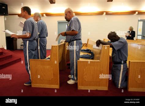 Prisoner Karl Stephen Kneels During A Service By Rev J Allison Defoor S Service In The Chapel