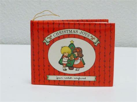 A Red Box With A Christmas Card On It