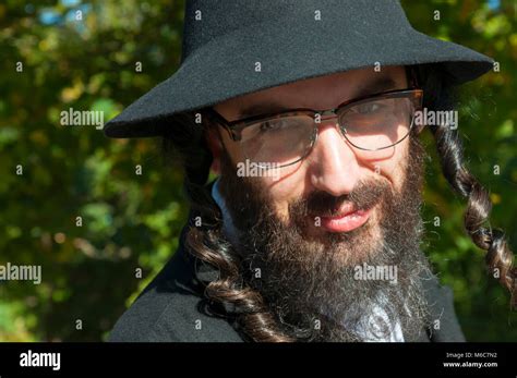 Outdoor Sunny Portrait Of A Smiling Young Traditional Orthodox Jewish