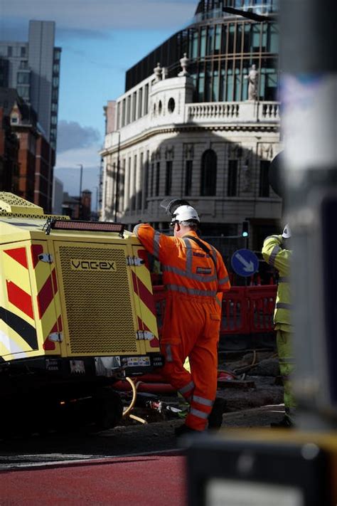 Road Construction and Road Workers in City · Free Stock Photo