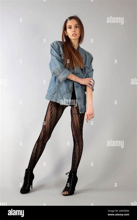 A Beautiful Brunette Model Hi Res Fashion Studio Shot Stock Photo Alamy
