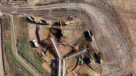 Tipper Trucks Being Loaded Up With Earth From A Conveyor Stock Footage