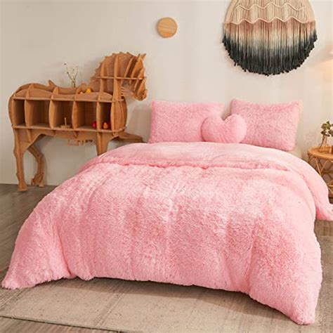 Add Luxury And Comfort To Your Bedroom With A Pink Faux Fur Comforter