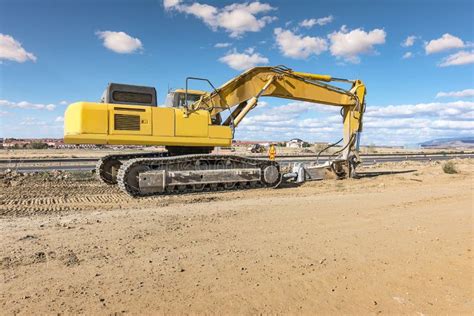 Hydraulic Hammer In The Construction Works Of A Road Stock Image