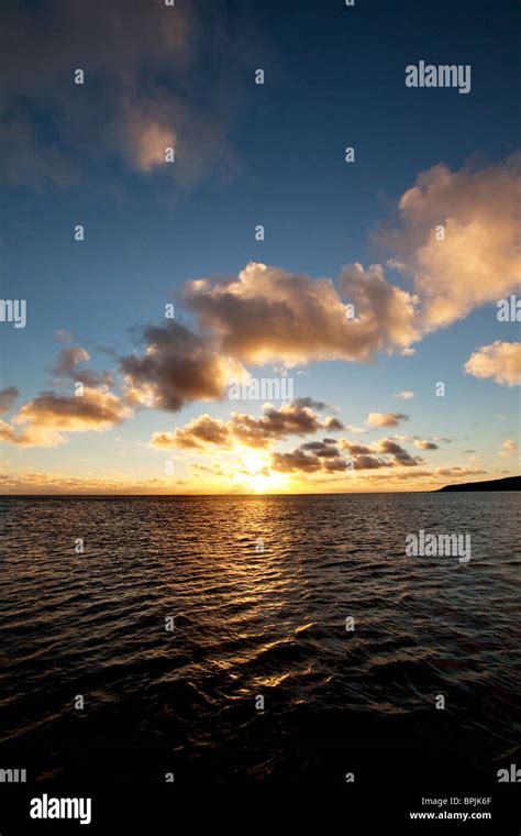 Sunset over ocean, Hawaii Stock Photo - Alamy