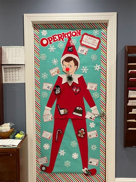 A Door Decorated With An Elf S Costume And Other Items For Christmas Decorations On Display