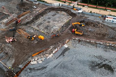 Premium Photo Aerial View Of Construction Site With Excavators And