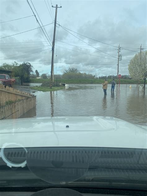 California storms breach canal, flood homes in Tulare County