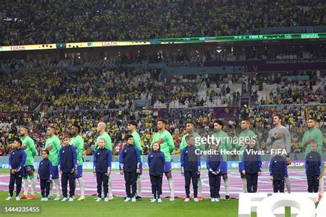 Brazil players lines up for the national anthem prior to the FIFA ...