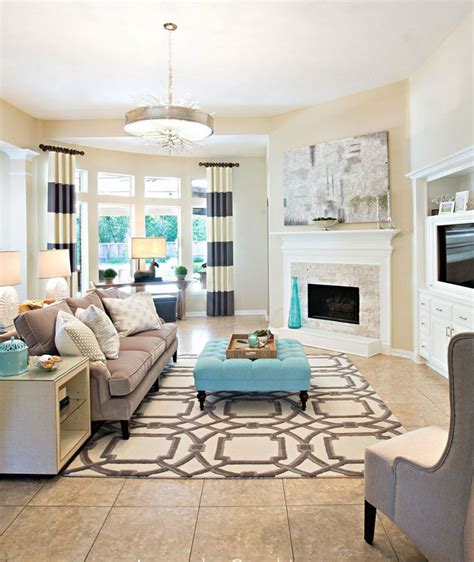 Cream Colored Living Room With Pops Of Teal Room Decor And Design