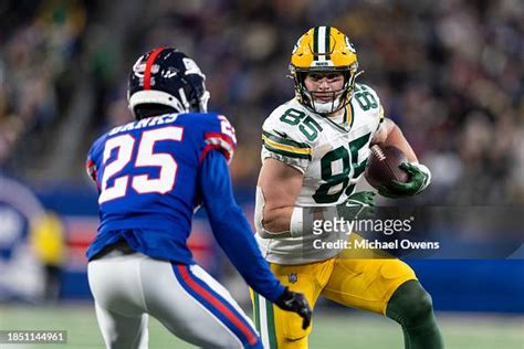 Tucker Kraft Of The Green Bay Packers Runs With The Ball Against