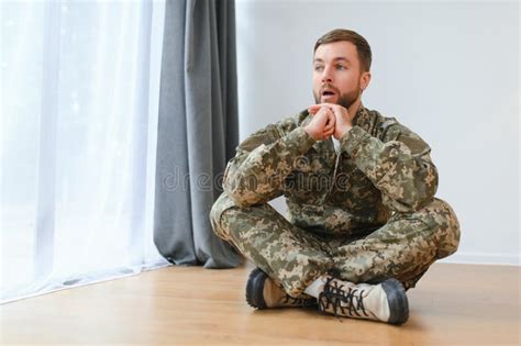 Military Veteran With Post Traumatic Stress Disorder Screaming At Home