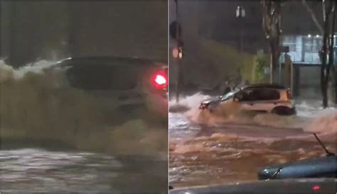 V Deo Casal Tem Carro Arrastado Por Correnteza Durante Chuva Na