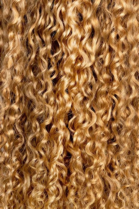 A Natural Medium Blonde Shade With A Blend Of Golden And Ash