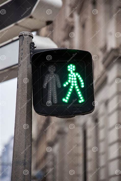 Pedestrian Green Light On A Traffic Light Abiding By The French And