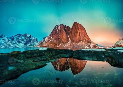 Aurora Borealis Or Northern Lights Over Hamnoy Fishing Village In The