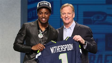 Seahawks First Round Pick Devon Witherspoon Absent From First Day Of Training Camp Due To