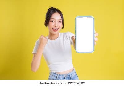 Young Asian Woman Holding Phone Cheerful Stock Photo 2222590201 ...